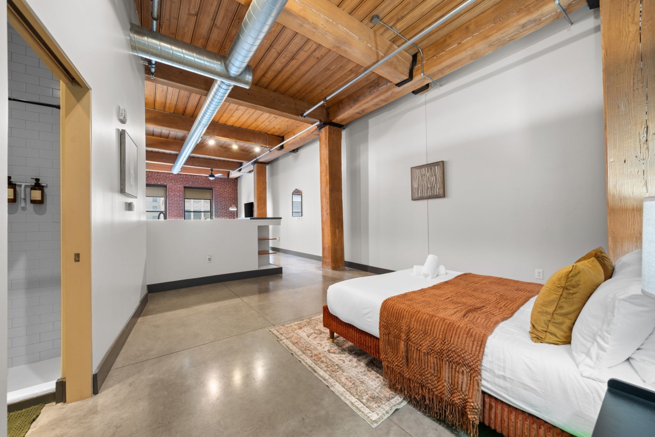 Cozy Open Sleeping Area – A comfortable queen bed offers a welcoming place to relax and recharge. (NOTE: There's no privacy door to this extra bed)