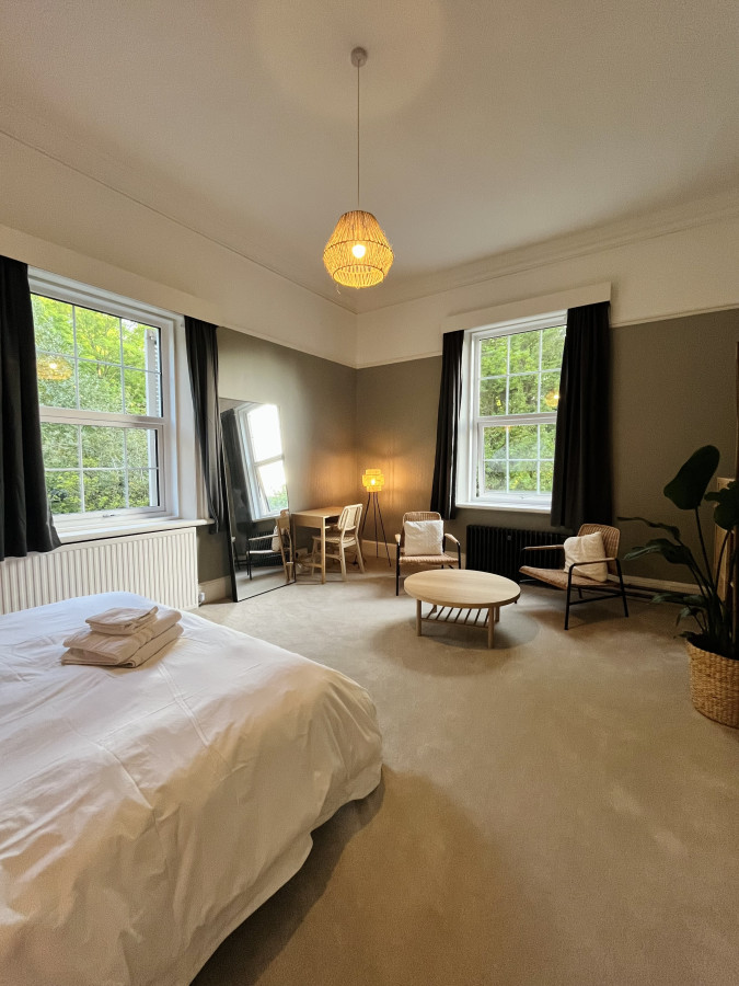 Suite with bathroom and desk