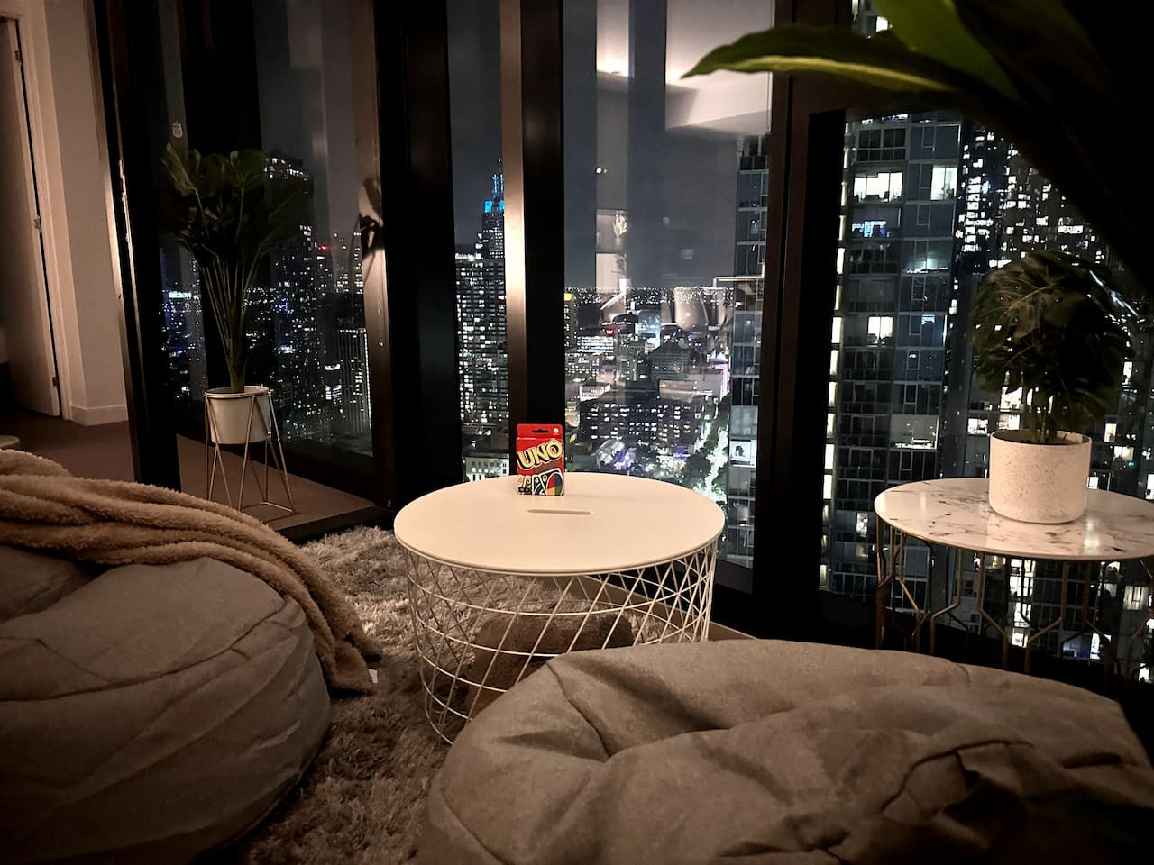 Unique Comfortable Balcony With Controllable Fairy Lights, Bean Bags, Card Games, Blankets, and Pillows