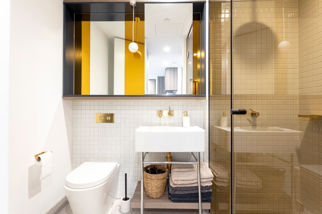 Clean Bathroom with Towels, Hand Soap, Conditioner, Body Wash & Shampoo