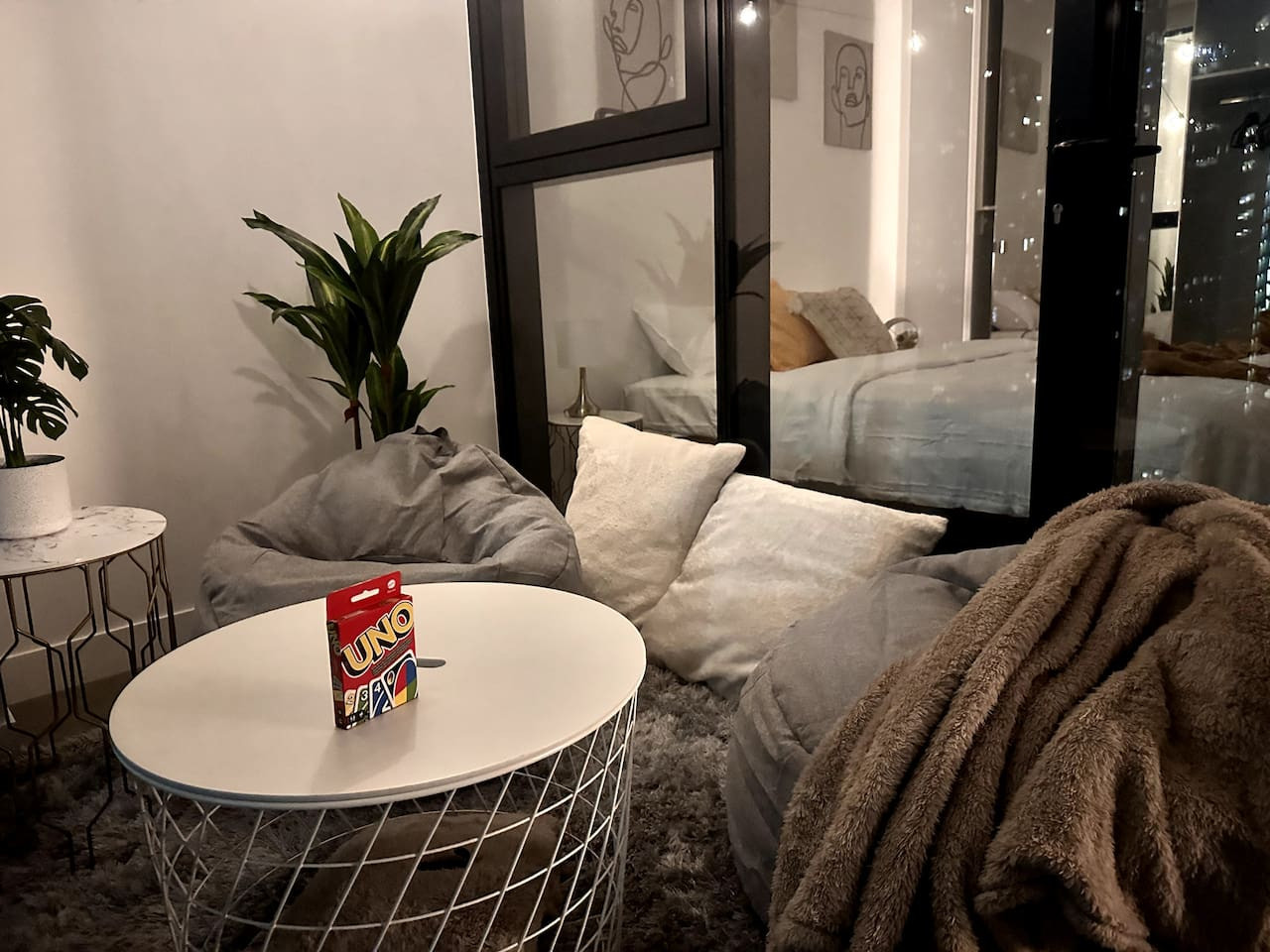 Unique Comfortable Balcony With Controllable Fairy Lights, Bean Bags, Card Games, Blankets, and Pillows