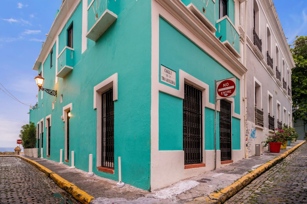 Blue and white building with a balcony — Ocean Breeze | Old San Juan | Spanish Style, Old San Juan