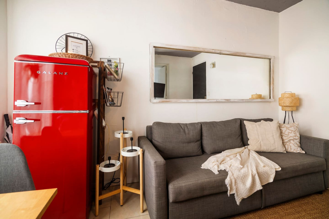 Red refrigerator in a kitchen — Sunset Haven | Ocean Breeze | Old San Juan, Old San Juan