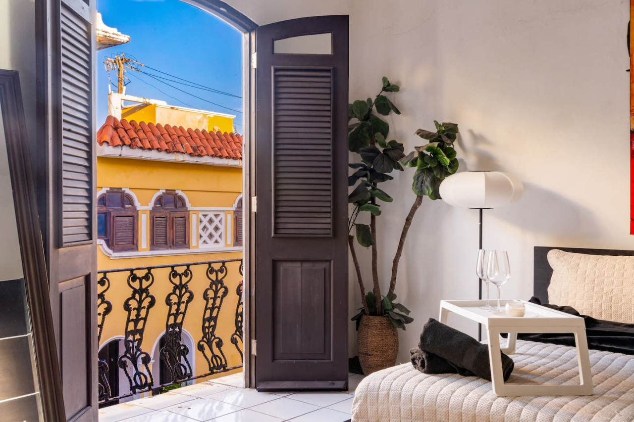 View of the ocean from the balcony of a vacation rental — Spanish Penthouse Historic Mansion Private Patio, Old San Juan