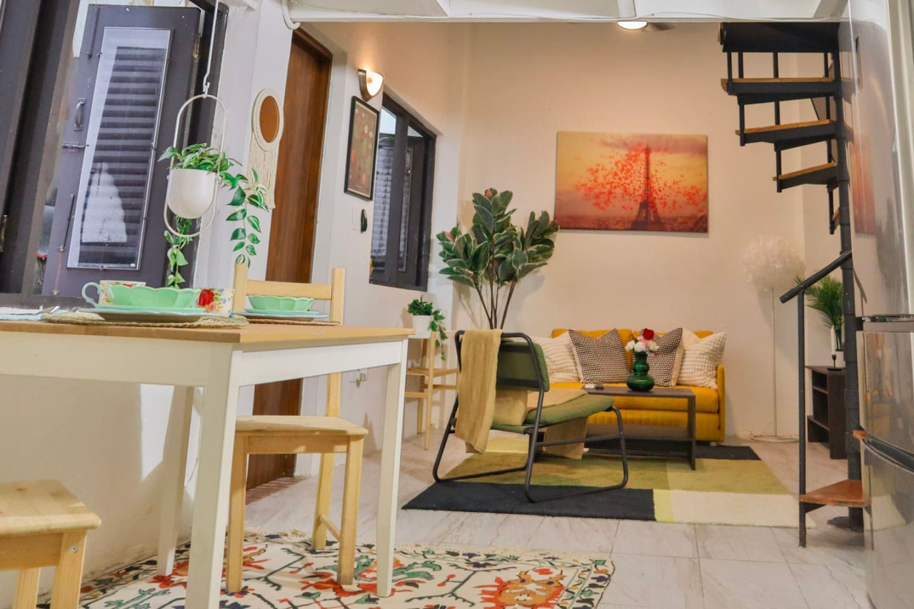 Living room with a couch and a chair — Puerto Escape | Old San Juan, Old San Juan