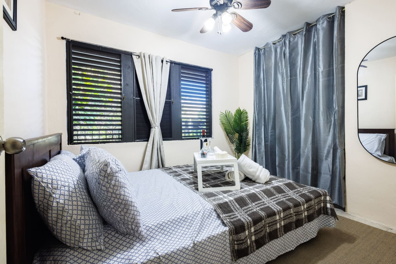 Bedroom with a bed and a table — Ocean Sol Historic Old San Juan, Old San Juan