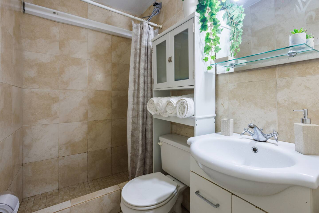 White toilet in a bathroom — Ocean Sol Historic Old San Juan