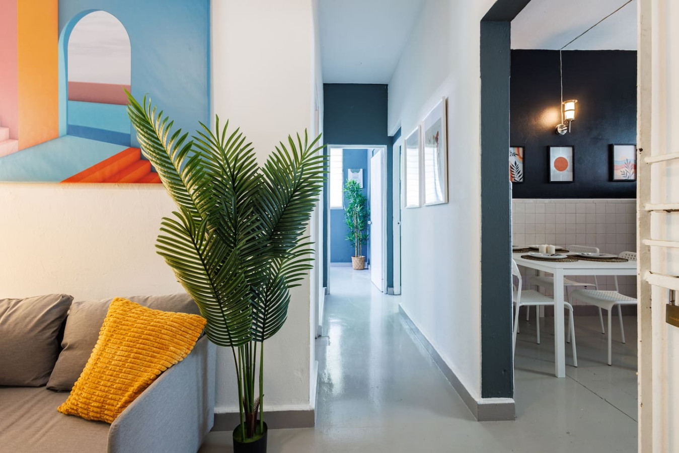 Living room with a hallway to the dining area — Spain Lagoon | San Juan | Private Patio, Santurce