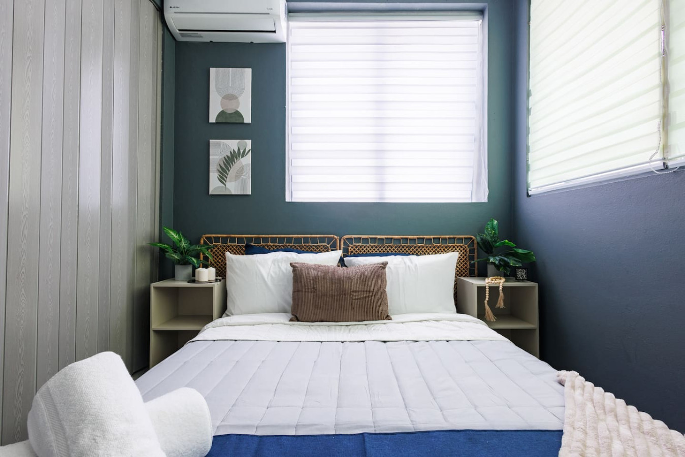 Bedroom with a bed and a window — Spain Lagoon | San Juan | Private Patio, Santurce