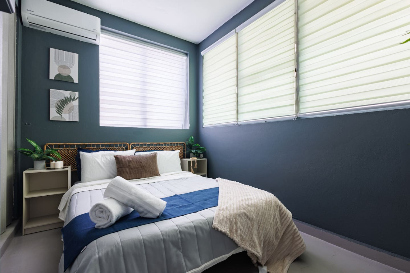 Bedroom with a bed and a window with white curtains — Spain Lagoon | San Juan | Private Patio, Santurce
