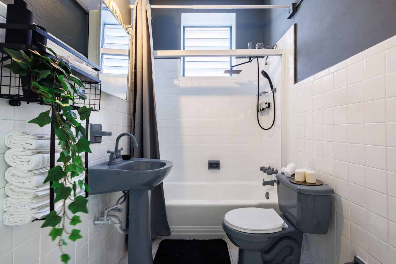 Bathroom with a toilet and a sink — Spain Lagoon | San Juan | Private Patio, Santurce
