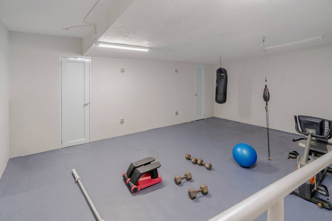 Gym in the building with weights and an exercise bike — OceanSide - Pool Balcony, Isla Verde