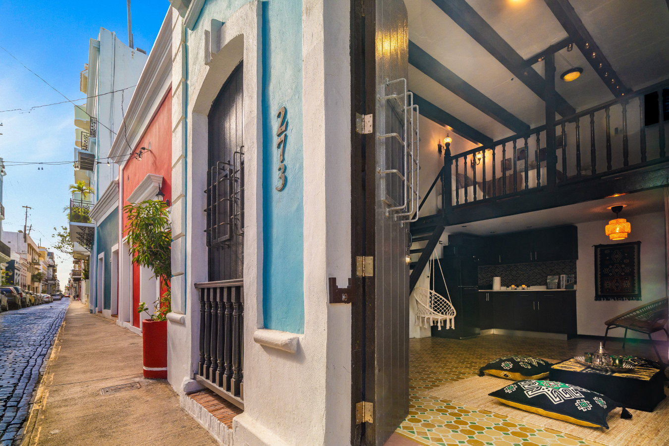 Blue and white building with a balcony — Morocco Loft Sanjuanero | Viejo San Juan, Old San Juan