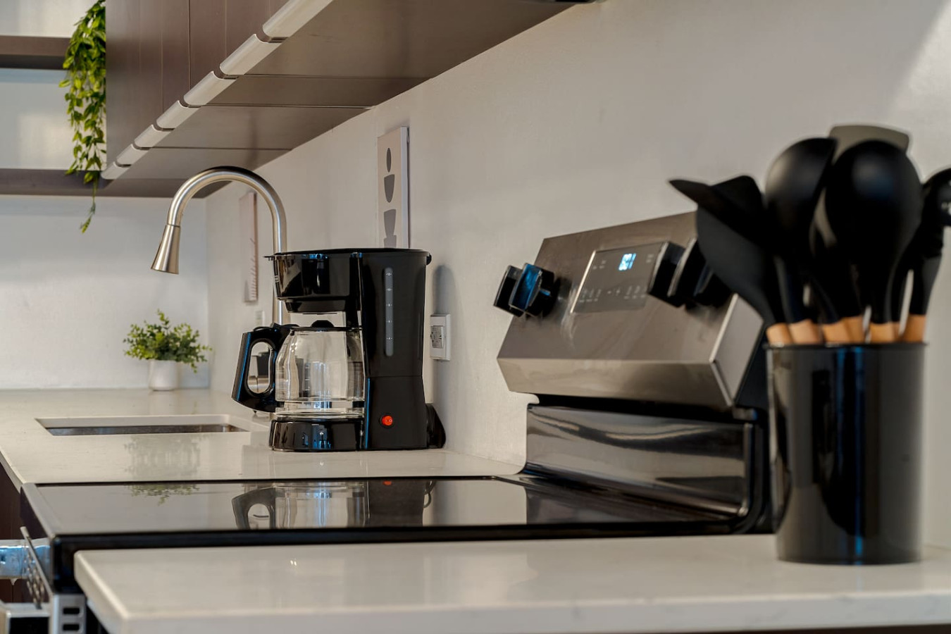 Kitchen with a black coffee maker and a silver toaster — Royal Palm Old San Juan, Old San Juan