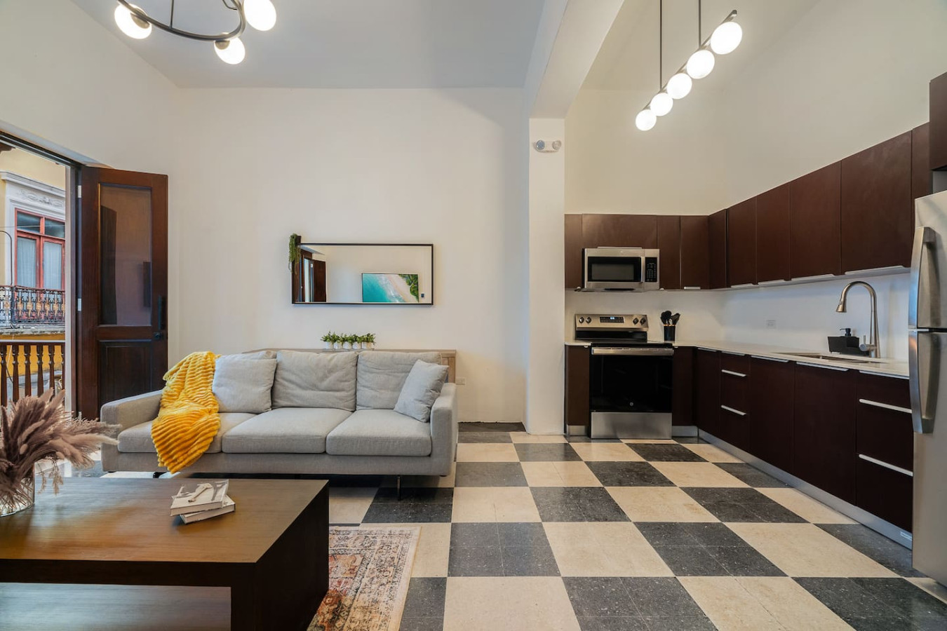 Living room with a couch and a coffee table — Soho House  The Grand Patio, Old San Juan