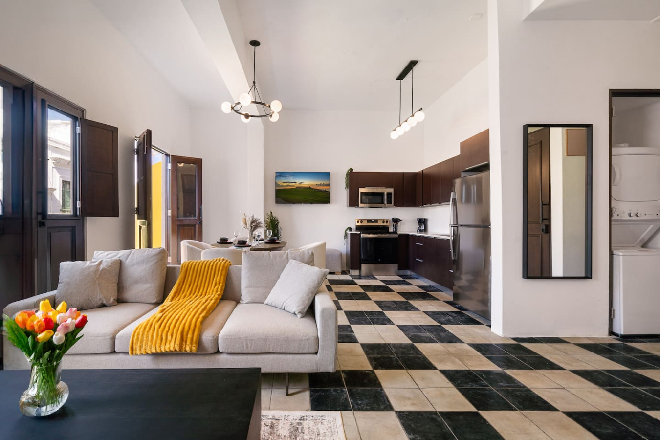 Living room with a couch and a table — Soho Garden Grand patio, Old San Juan