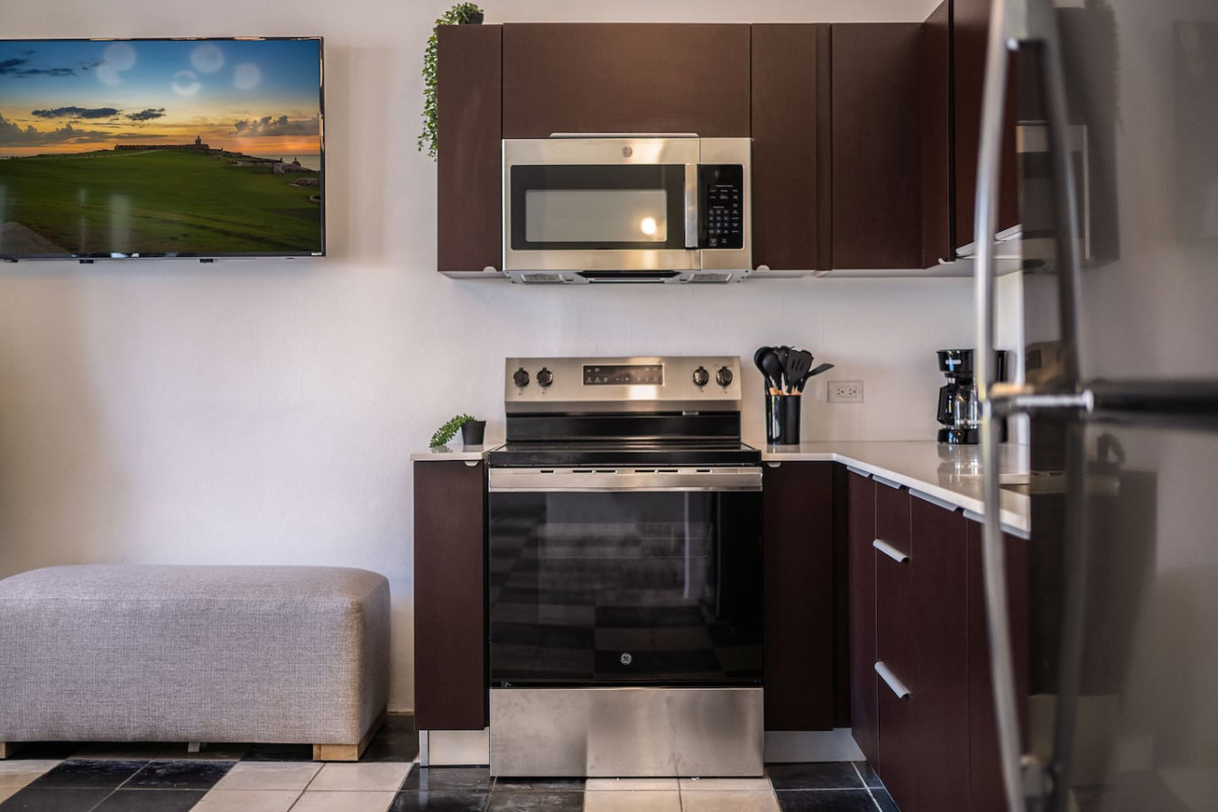 Black stove top oven in a kitchen — Soho Garden Grand patio, Old San Juan