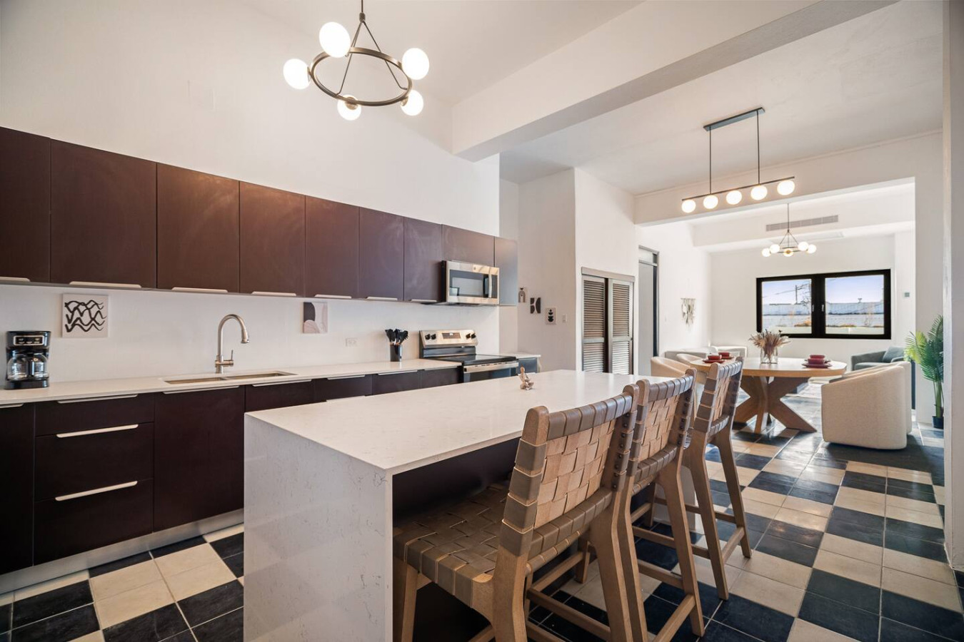Kitchen with a sink, stove, and countertops — Soho House – Inspired by RH, Old San Juan
