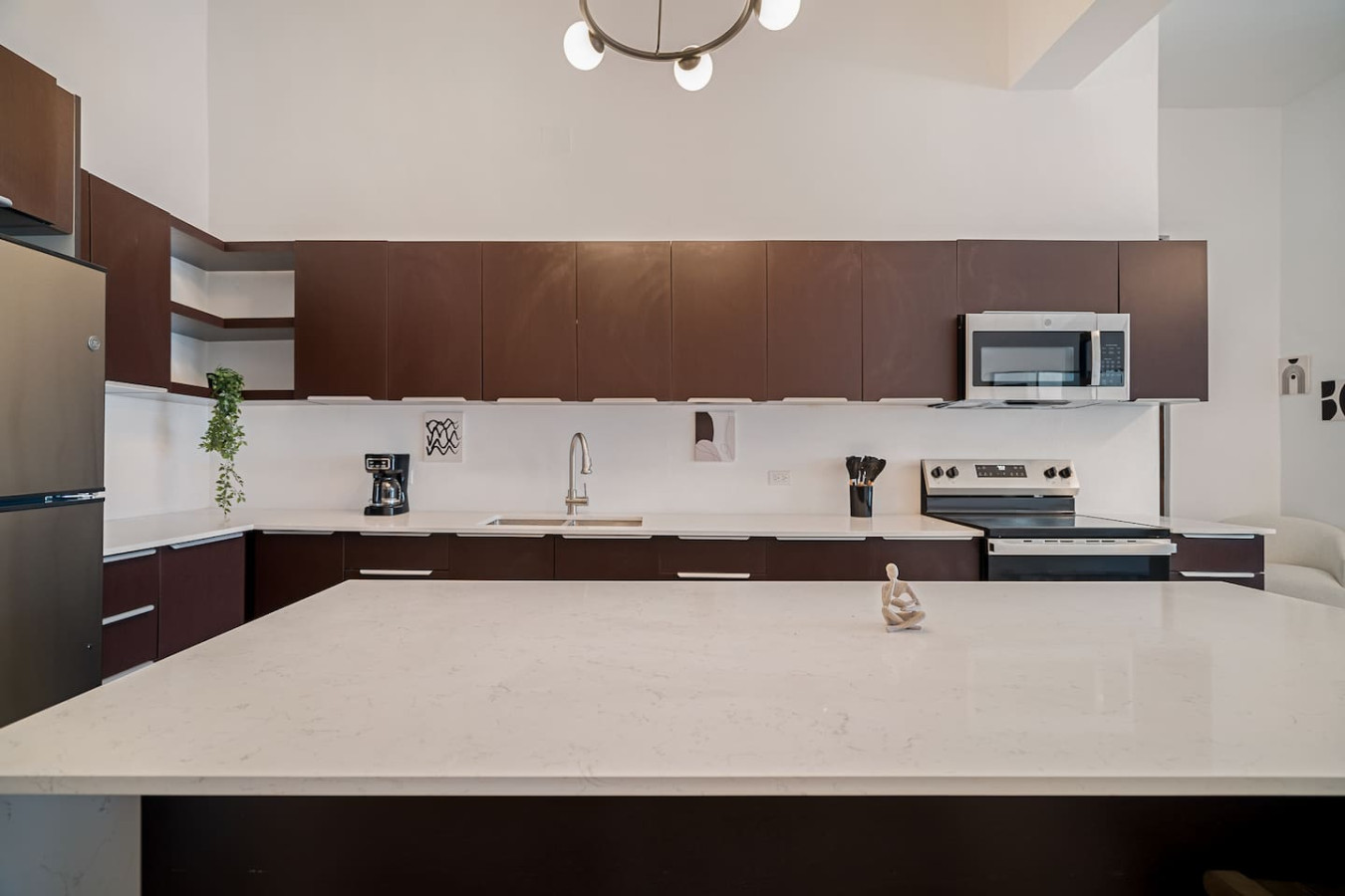 Kitchen with a white countertop and a white sink — Soho House – Inspired by RH, Old San Juan