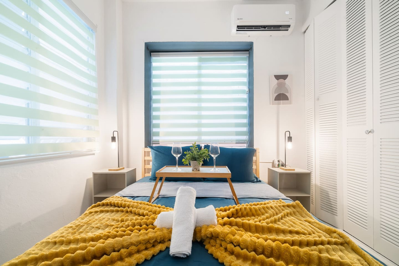 Bedroom with a bed, table, and window — Puerto House - Private Patio, Santurce