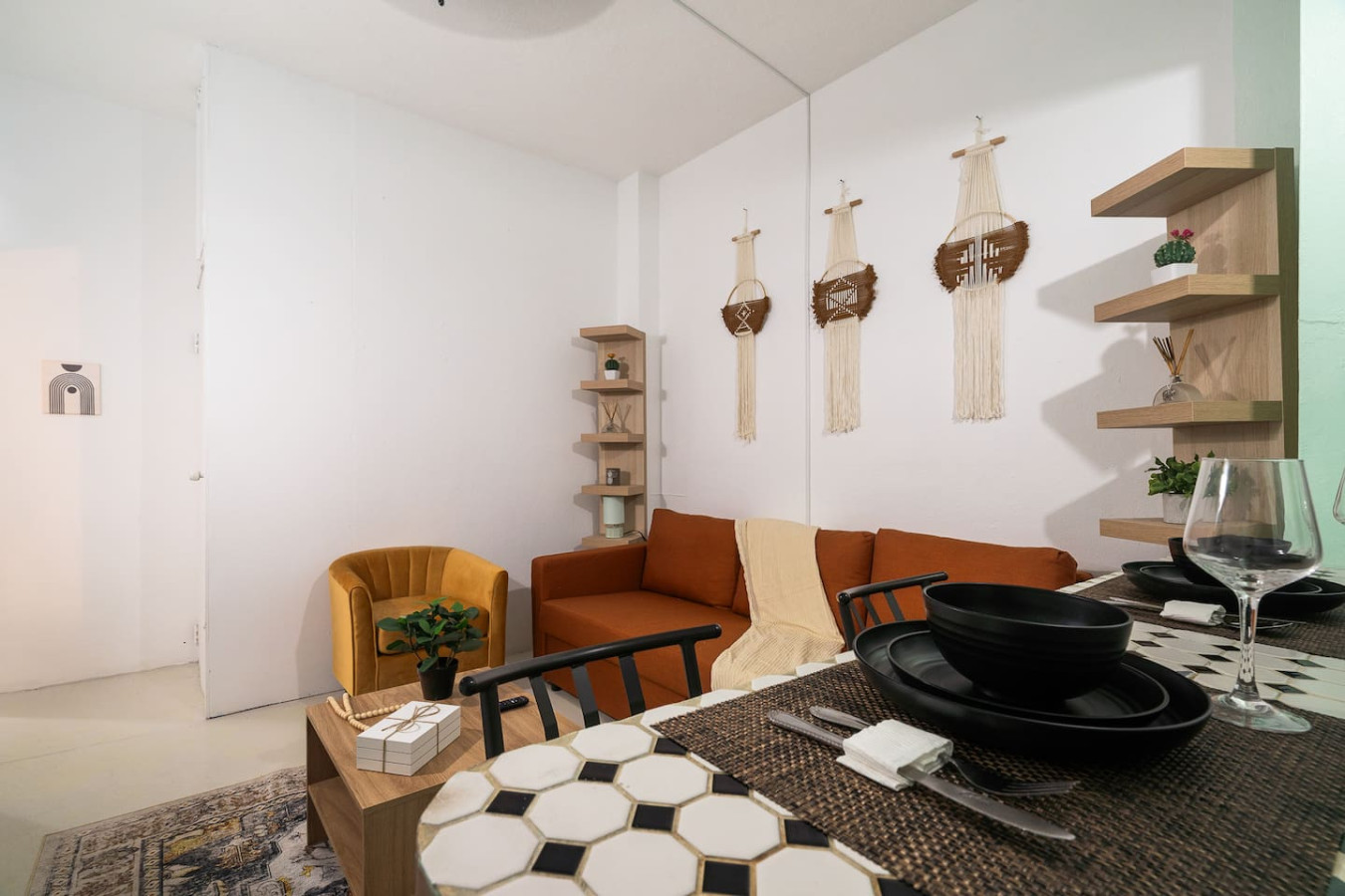 Tiled breakfast bar set for two, facing the living room — Puerto House - Private Patio, Santurce