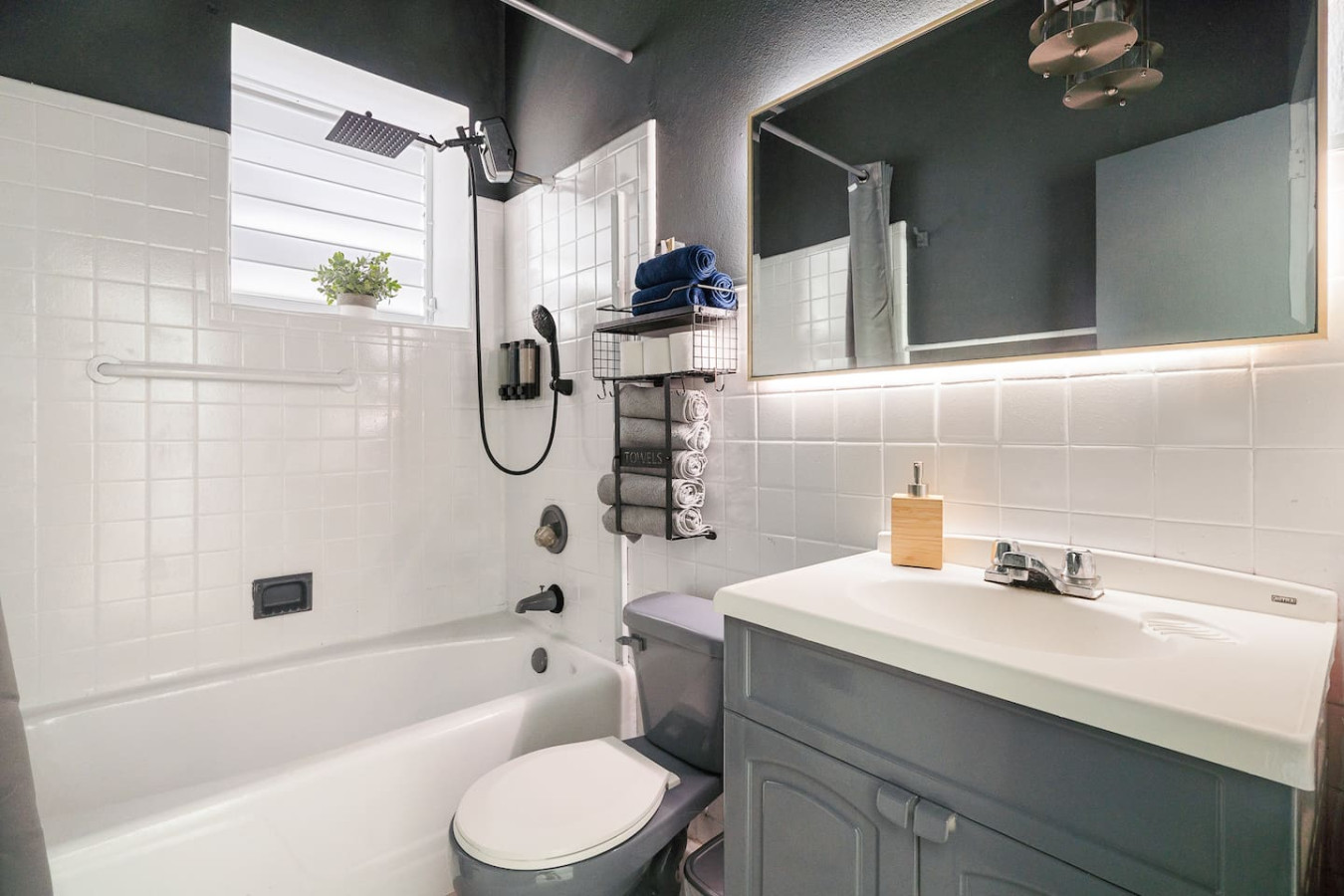 Bathroom with a toilet and a shower tub — Puerto House - Private Patio, Santurce