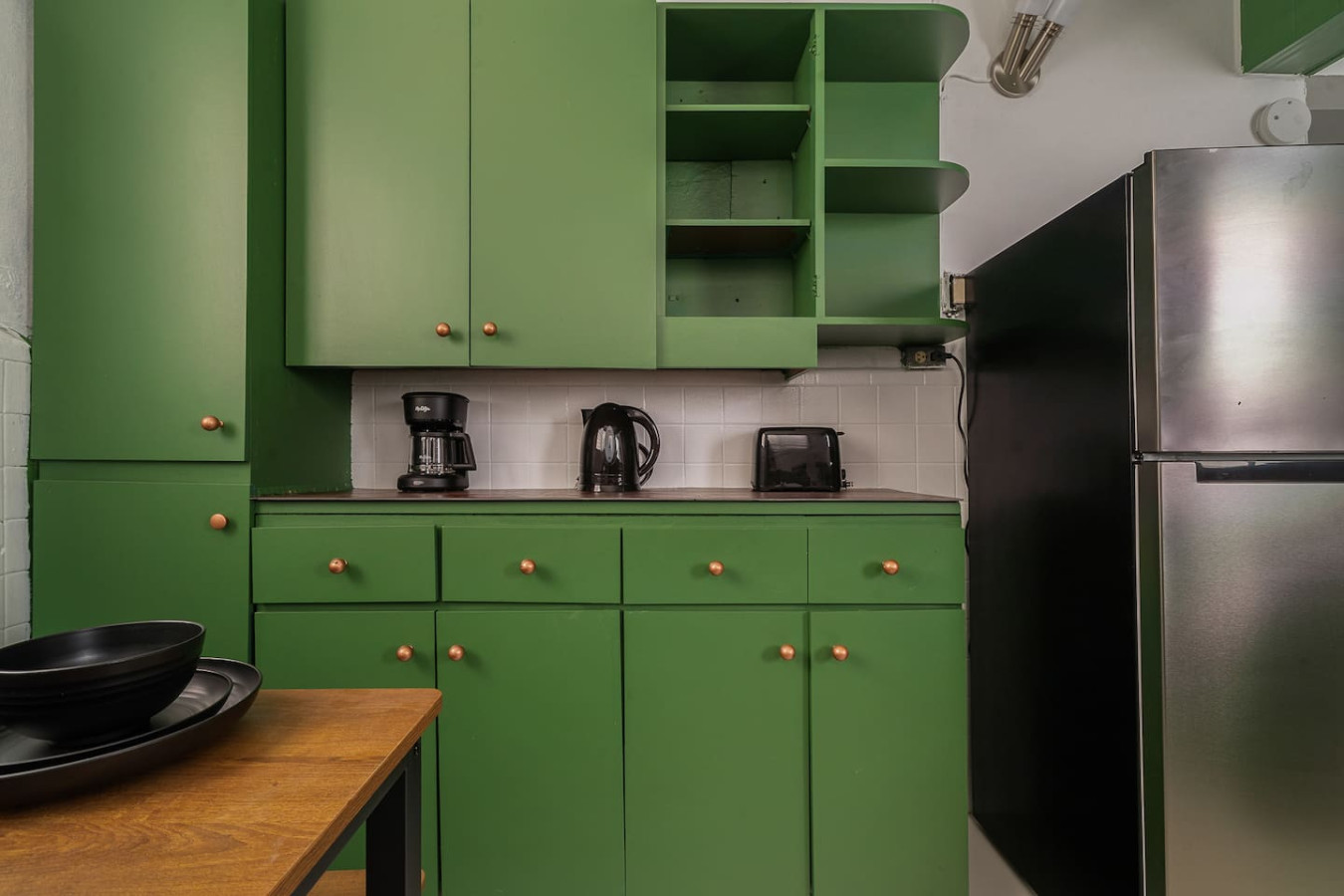 Kitchen with a coffee maker, kettle, toaster and fridge — Puerto Lagoon Downtown, Santurce