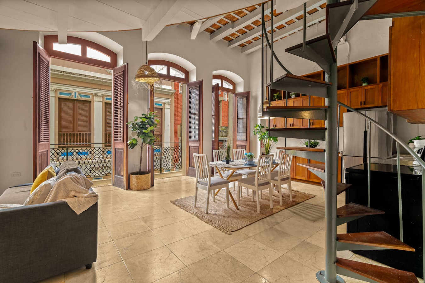 Dining table with chairs in a vacation rental property — Grand Palazzo del Mar, Old San Juan