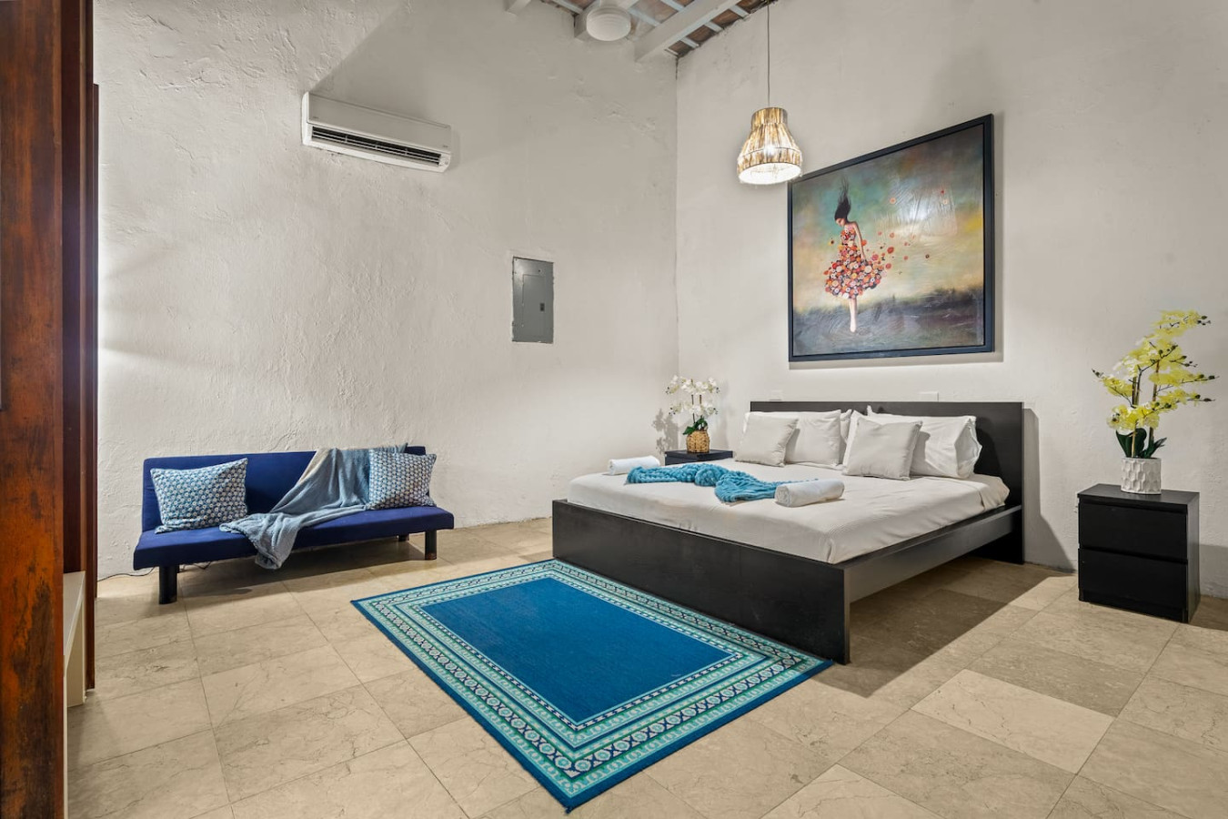 Bedroom with a bed and a painting on the wall — Grand Palazzo del Mar, Old San Juan