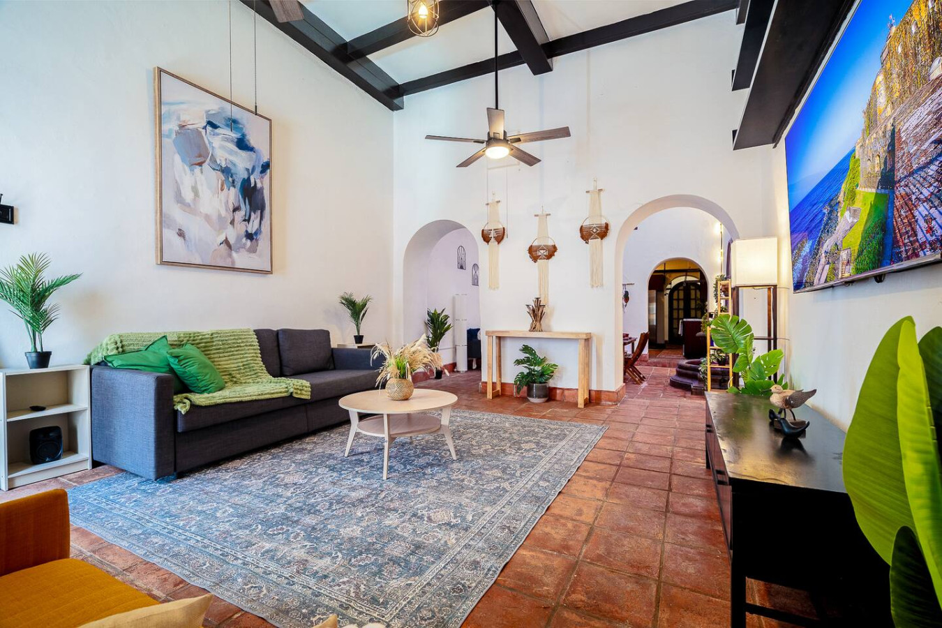 Living room with a couch and a table — Villa Mansion - Fountain & Rooftop - Old San Juan, Old San Juan