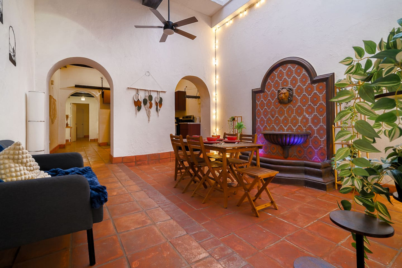 Dining table with chairs in a vacation rental property in — Villa Mansion - Fountain & Rooftop - Old San Juan, Old San Juan