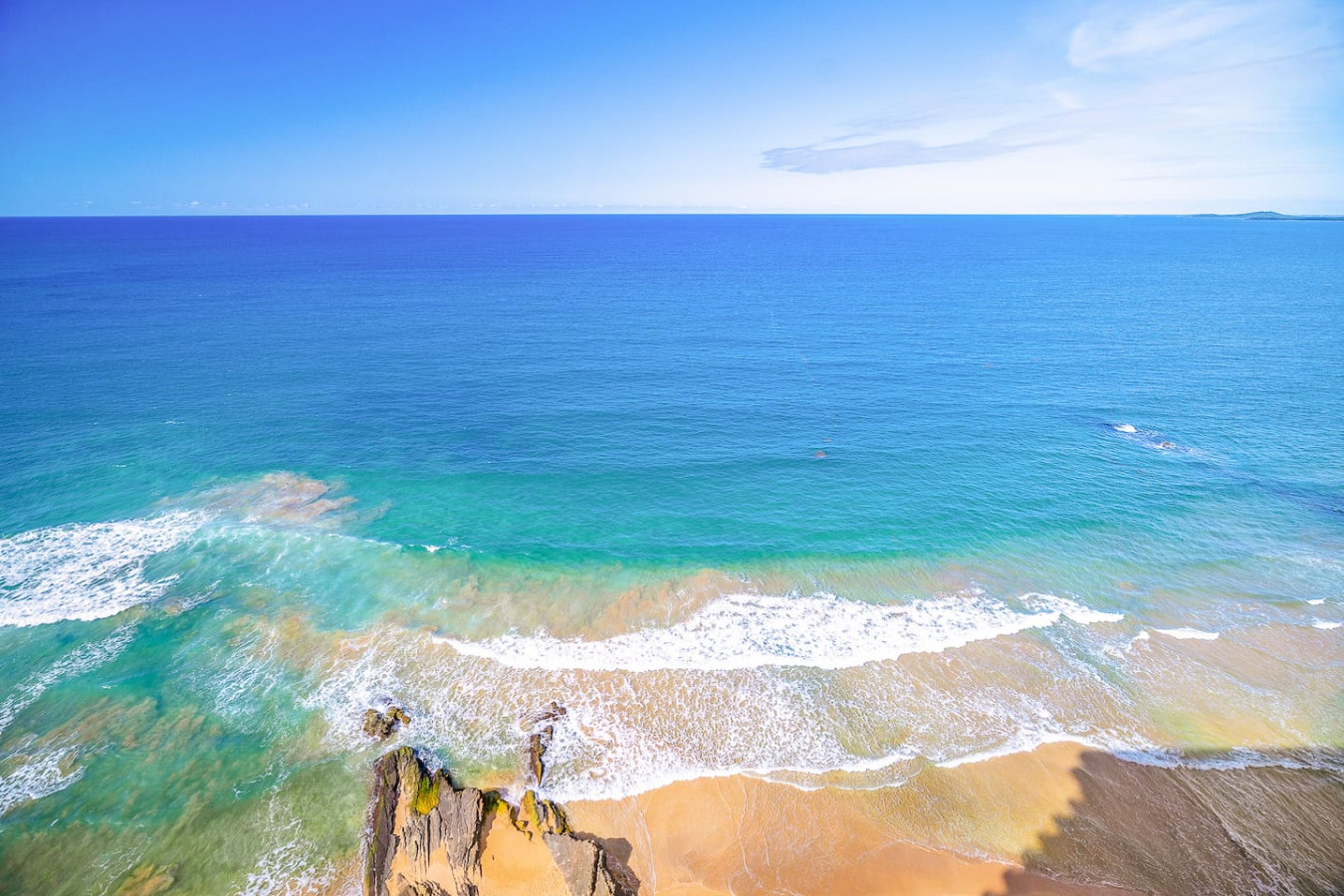 View of the ocean from the balcony of a vacation rental property in (balcony 2) — Captain’s Beachfront Luquillo Beach House, 