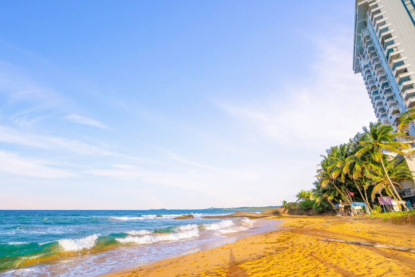 Beachfront property with a balcony overlooking the ocean — Captain’s Beachfront Luquillo Beach House, Luquillo
