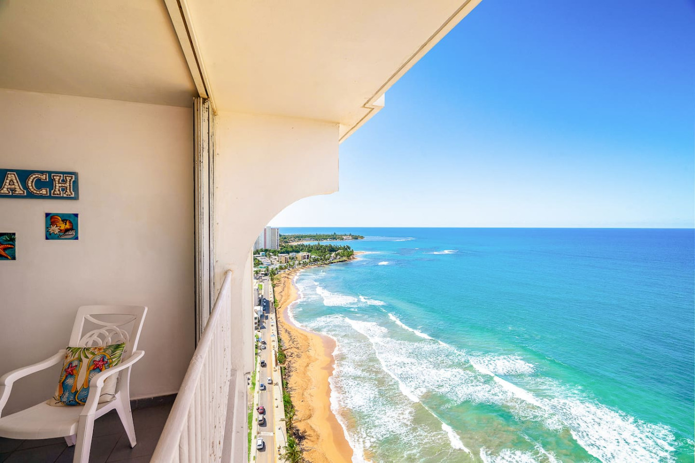 Balcony overlooking the ocean — Captain’s Beachfront Luquillo Beach House, Luquillo