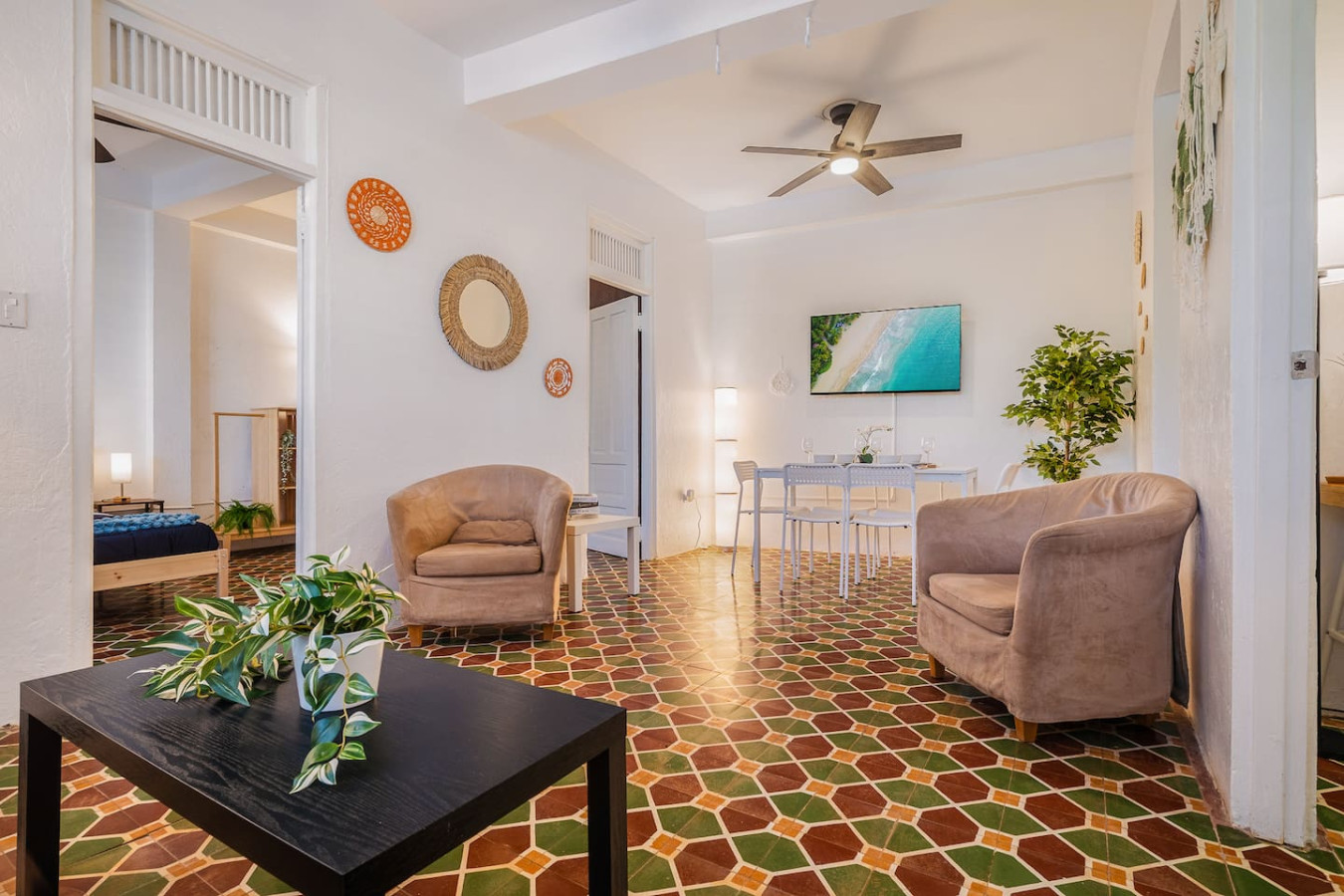 Living room with a couch and a table — Tapia Mosaic Beachwalk - San Juan, Santurce