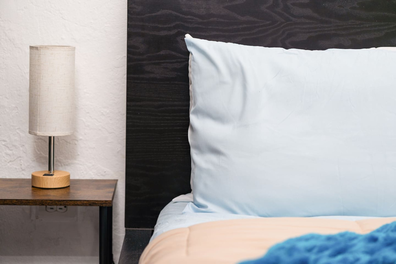Bedroom with a blue pillow on a bed — Loft La Luz - Old San Juan, Old San Juan