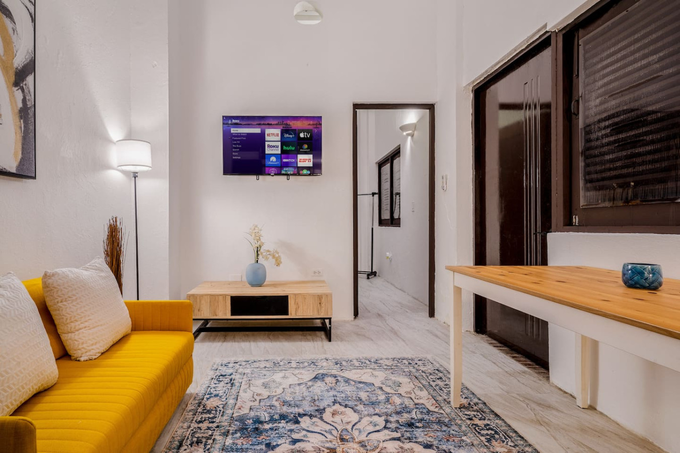 Living room with a flat screen TV on the wall — Loft La Luz - Old San Juan, Old San Juan
