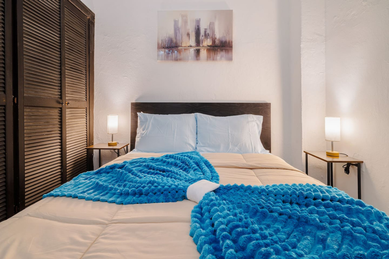 Bedroom with a blue blanket on the bed — Loft La Luz - Old San Juan, Old San Juan