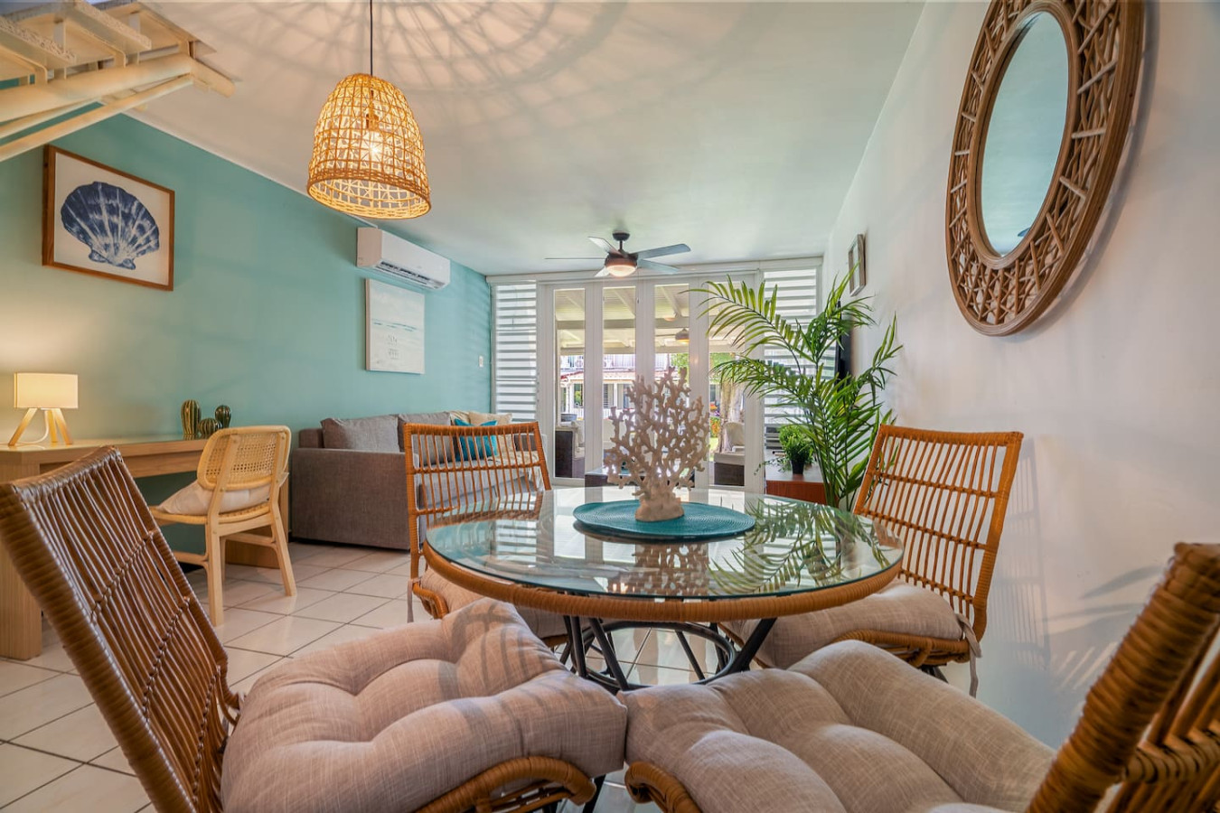 Dining table with chairs and a potted plant in the corner — Beach Villa Dorado Del Mar, Dorado