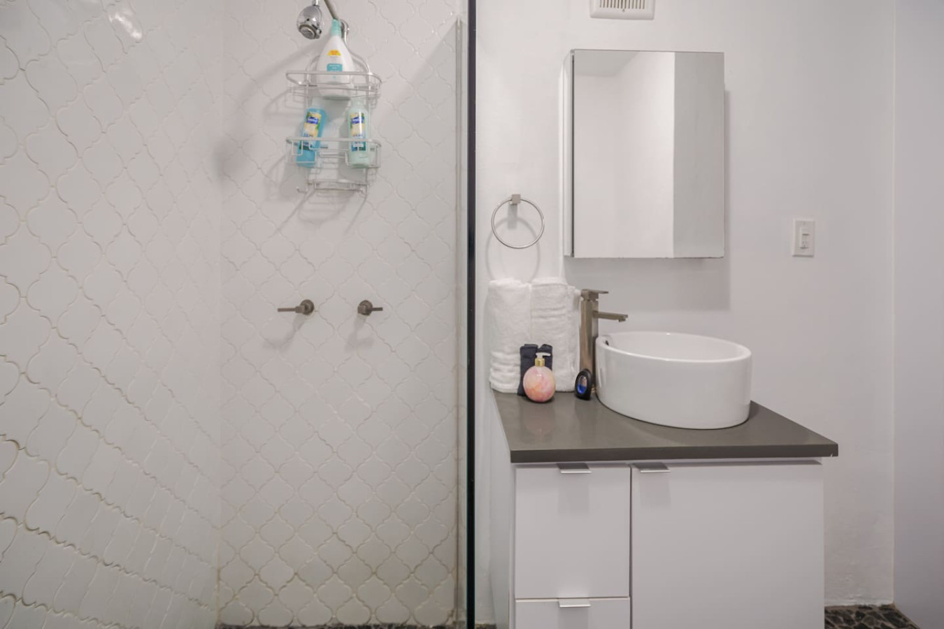 Bathroom with a shower and a mirror — Punta Las Marias Studio - Short Walk to the Beach, Santurce