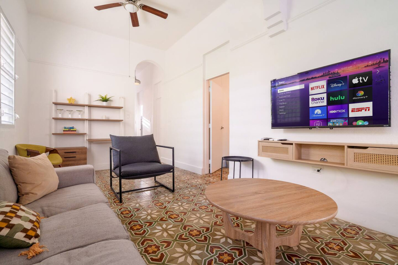 Black chair in a living room — Luz Collection No.2 – Casa Brisa | 3BR Retreat, Santurce