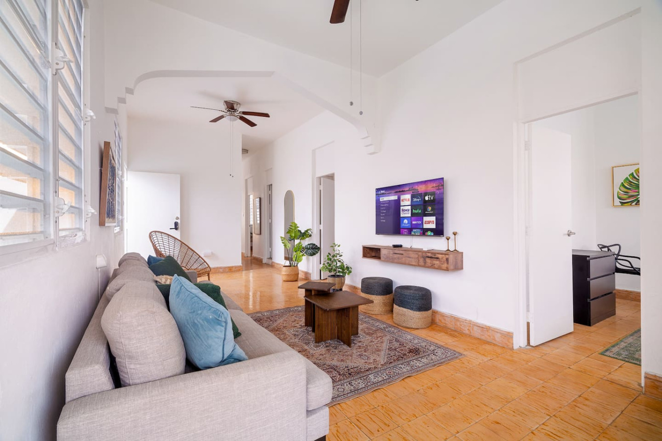 Living room with a couch, a chair, and a TV — Luz Collection No.3 – Casa Horizonte | 3BR Loft, Santurce