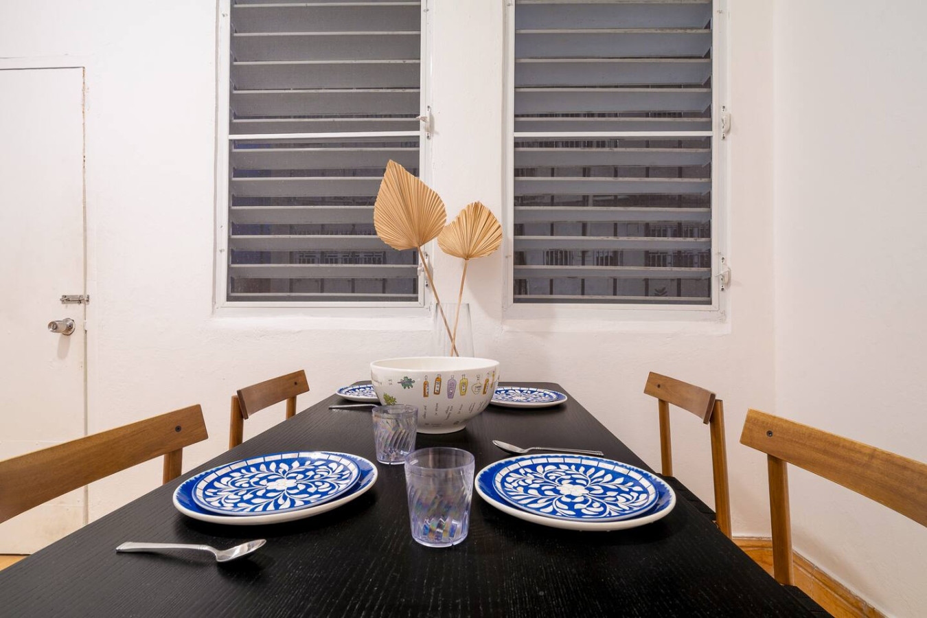 Table with a bowl and cups on it — Luz Collection No.3 – Casa Horizonte | 3BR Loft, Santurce
