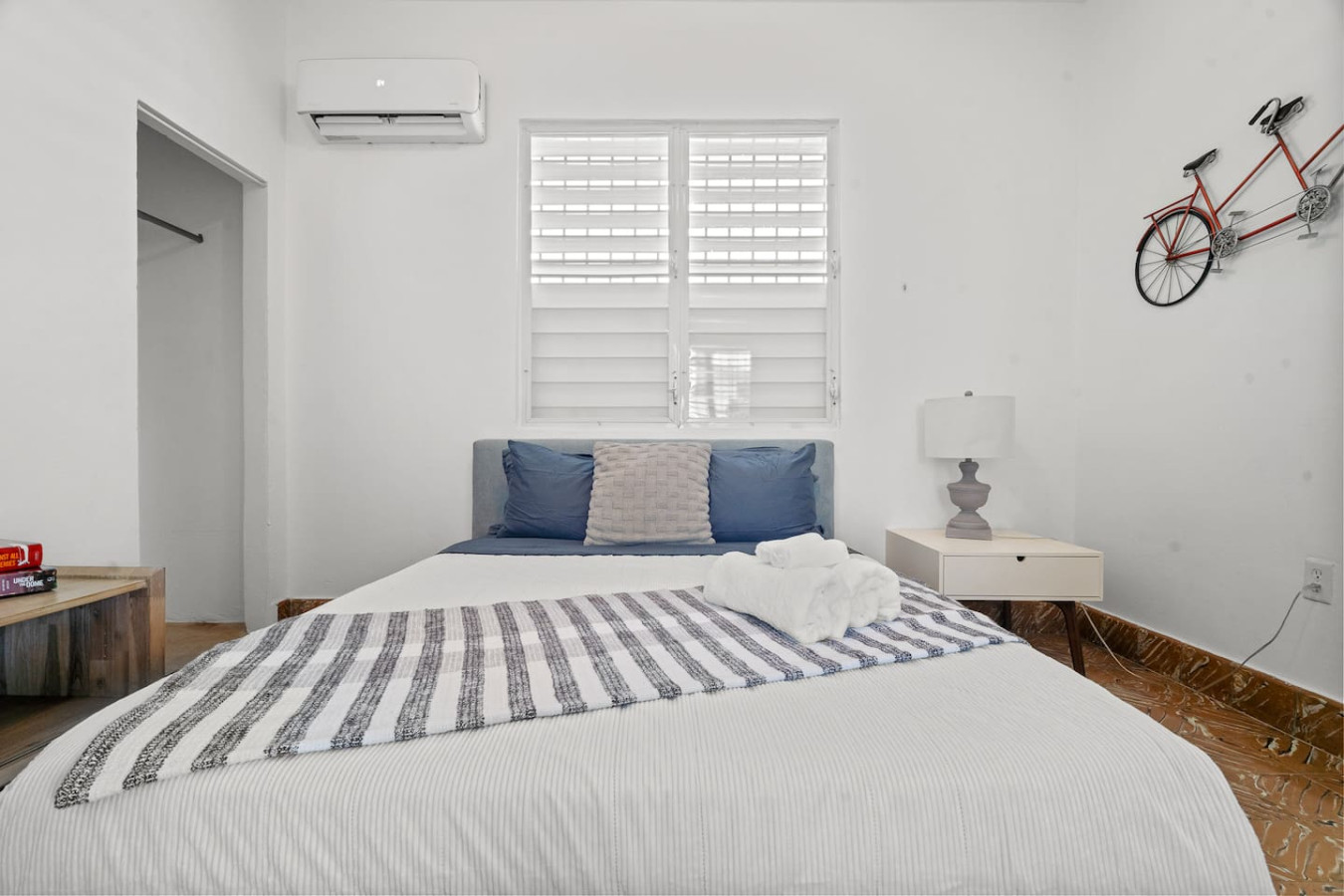 Bedroom with a white bed and blue pillows (bedroom 2) — Sunkiss in puerto Rico San Juan 3 Bedroom, Santurce