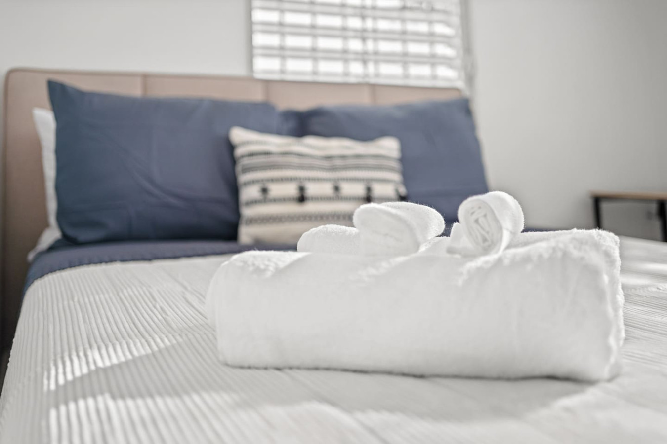 White towel on a bed — Sunkiss in puerto Rico San Juan 3 Bedroom, Santurce