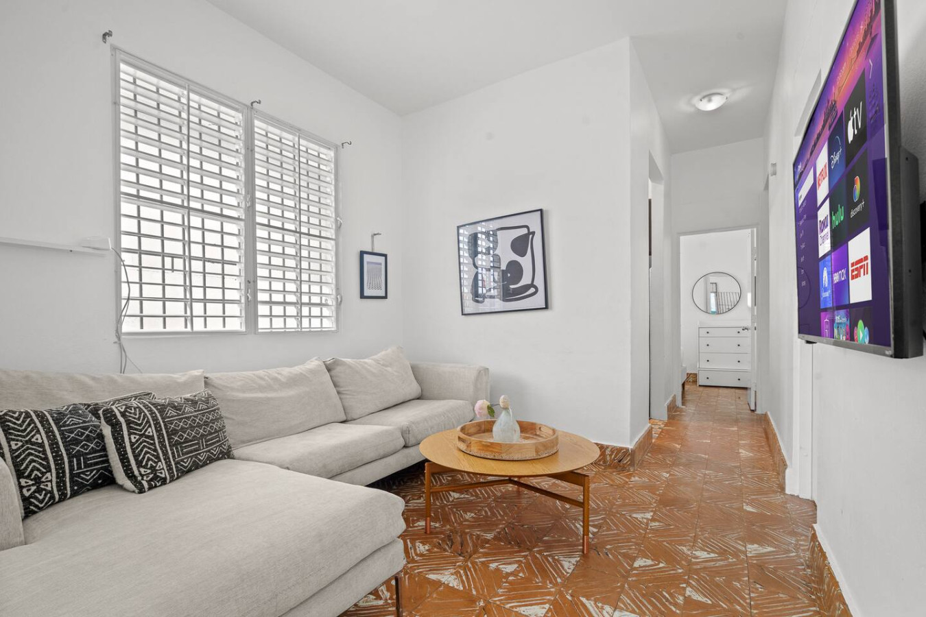 Living room with a couch and a table — Sunkiss in puerto Rico San Juan 3 Bedroom, Santurce