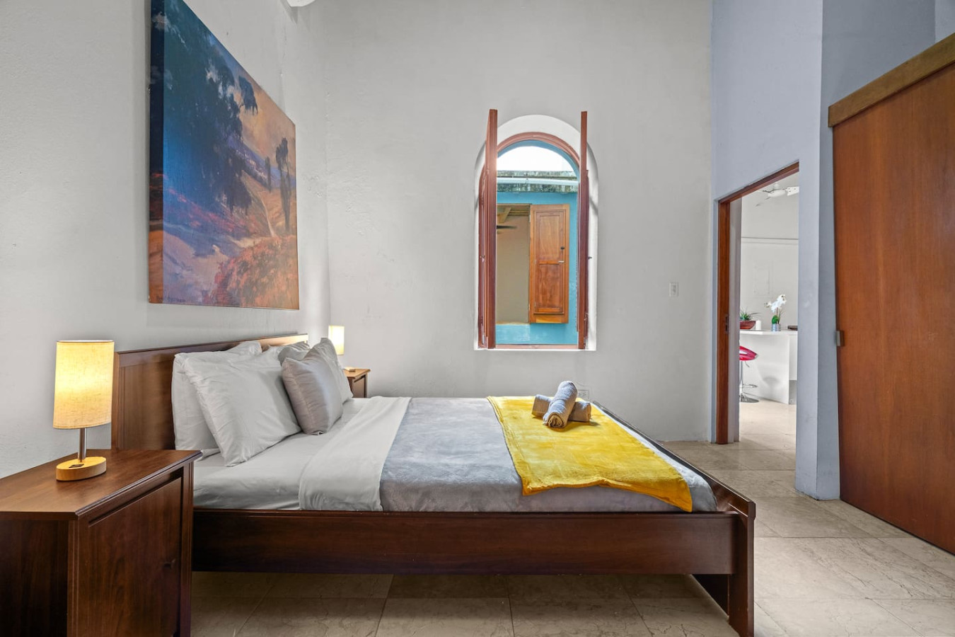 Bedroom with a bed and a window — Royal Imperial | Balcony Private | Old San Juan, Old San Juan