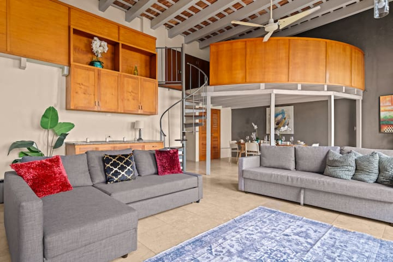 Living room with a couch and a chair — Royal Imperial | Balcony Private | Old San Juan, Old San Juan