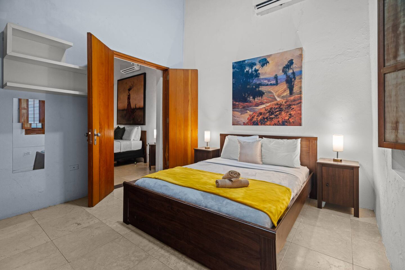 Bedroom with a bed and a painting on the wall — Royal Imperial | Balcony Private | Old San Juan, Old San Juan