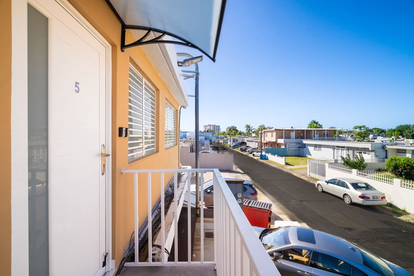 Balcony overlooking the ocean — MoonJoy Chic 2BR Apartment Private Patio, Carolina